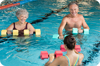 Elderly people swimming